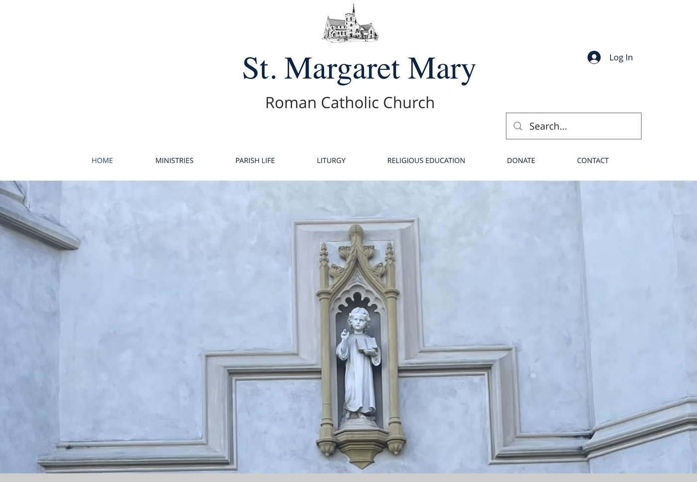 St. Margaret Mary Catholic Church homepage: parish name over a photo of a statue in a Gothic niche